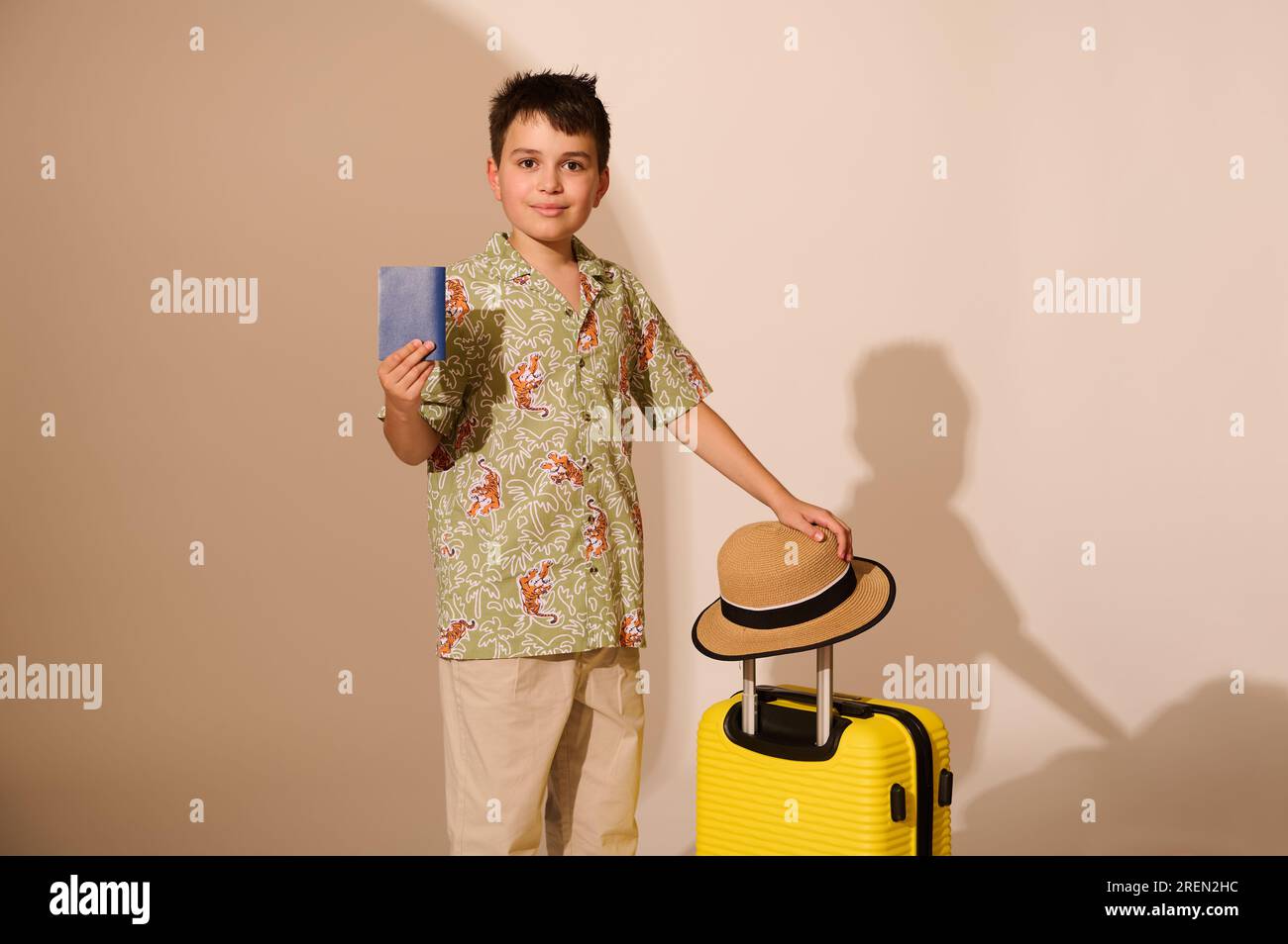 Charming Hispanic traveler teen boy, going for weekend getaway, travels ...