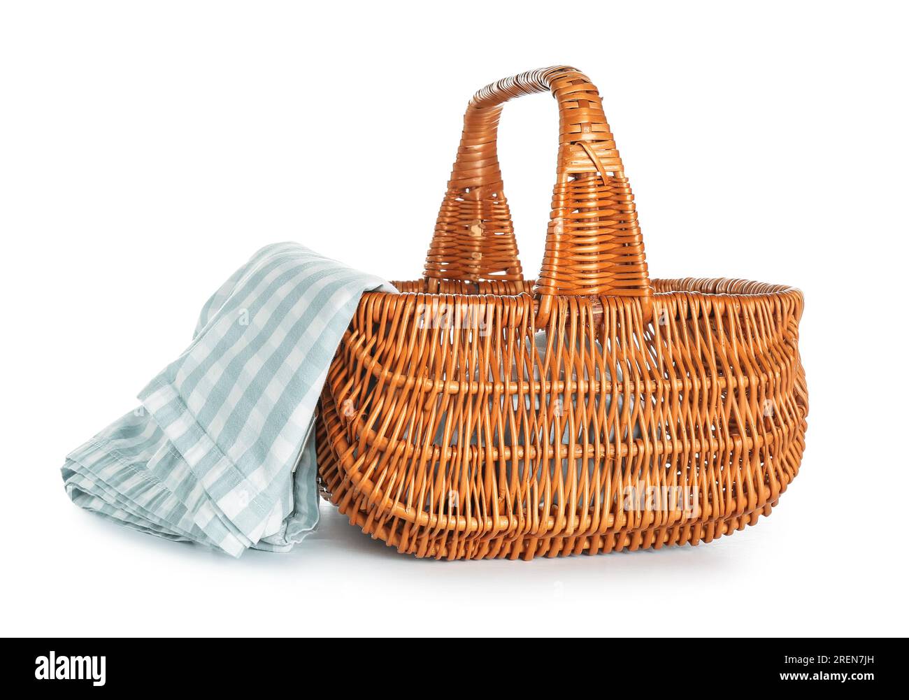 Wicker picnic basket with napkin on white background Stock Photo - Alamy