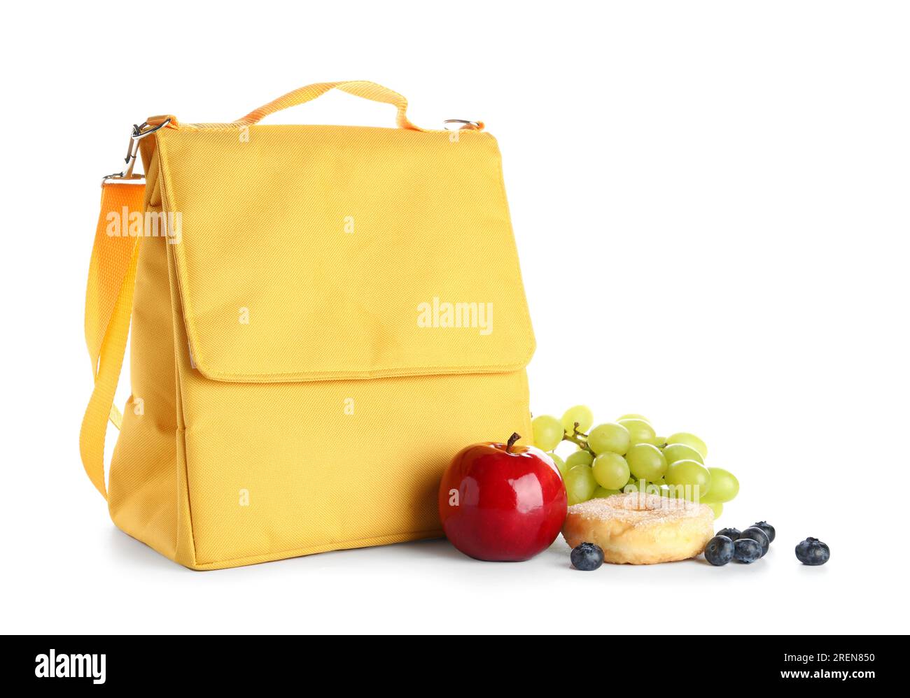 Lunch box bag with fruits and doughnut isolated on white background Stock Photo