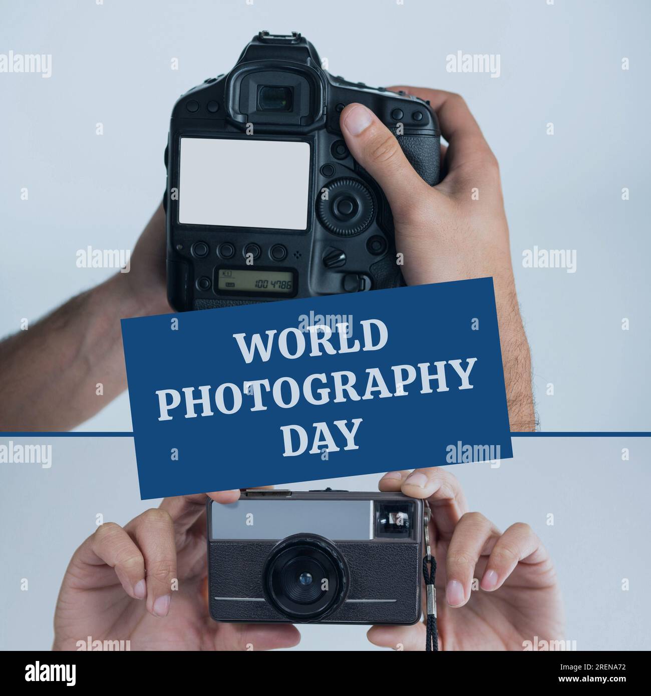 World photography day text on blue over diverse hands holding digital slr and compact cameras Stock Photo