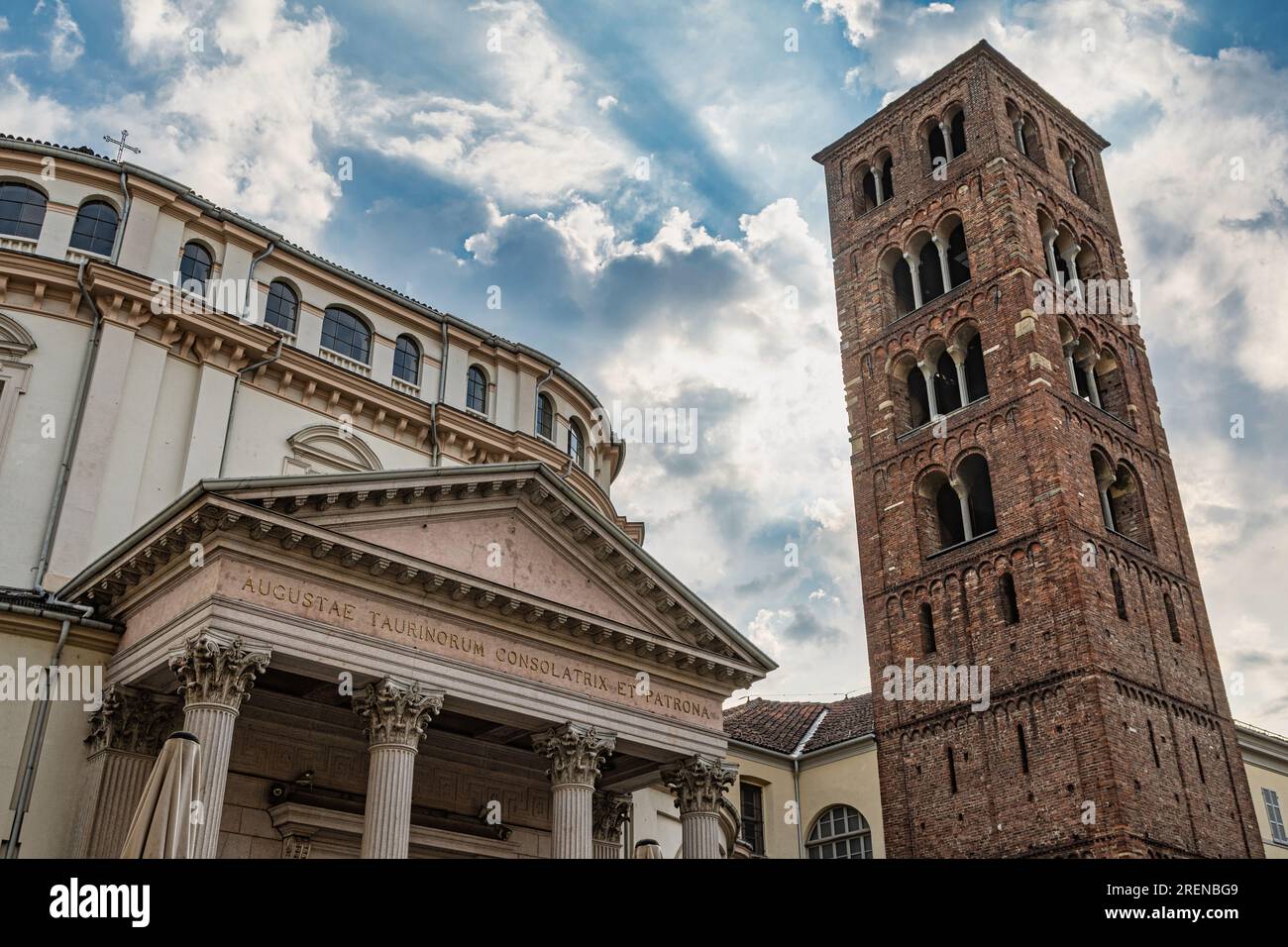 The bell tower and the facade of the sanctuary of the Consolata. One of the oldest places of worship in Turin. Turin, Turin province, Piedmon, Italy, Stock Photo