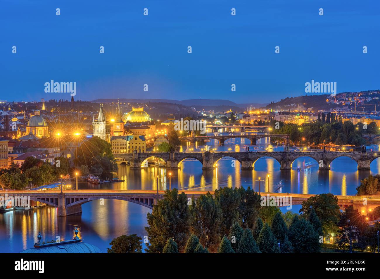 The bridges over the river Vltava in Prague at dusk Stock Photo