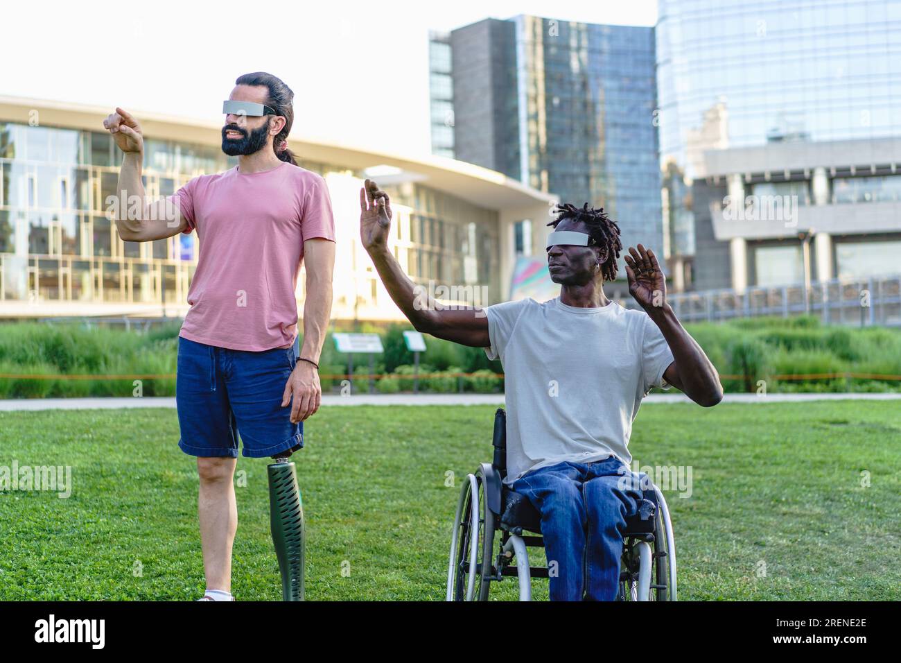 An African man in a wheelchair and a Hispanic man with a prosthetic leg ...
