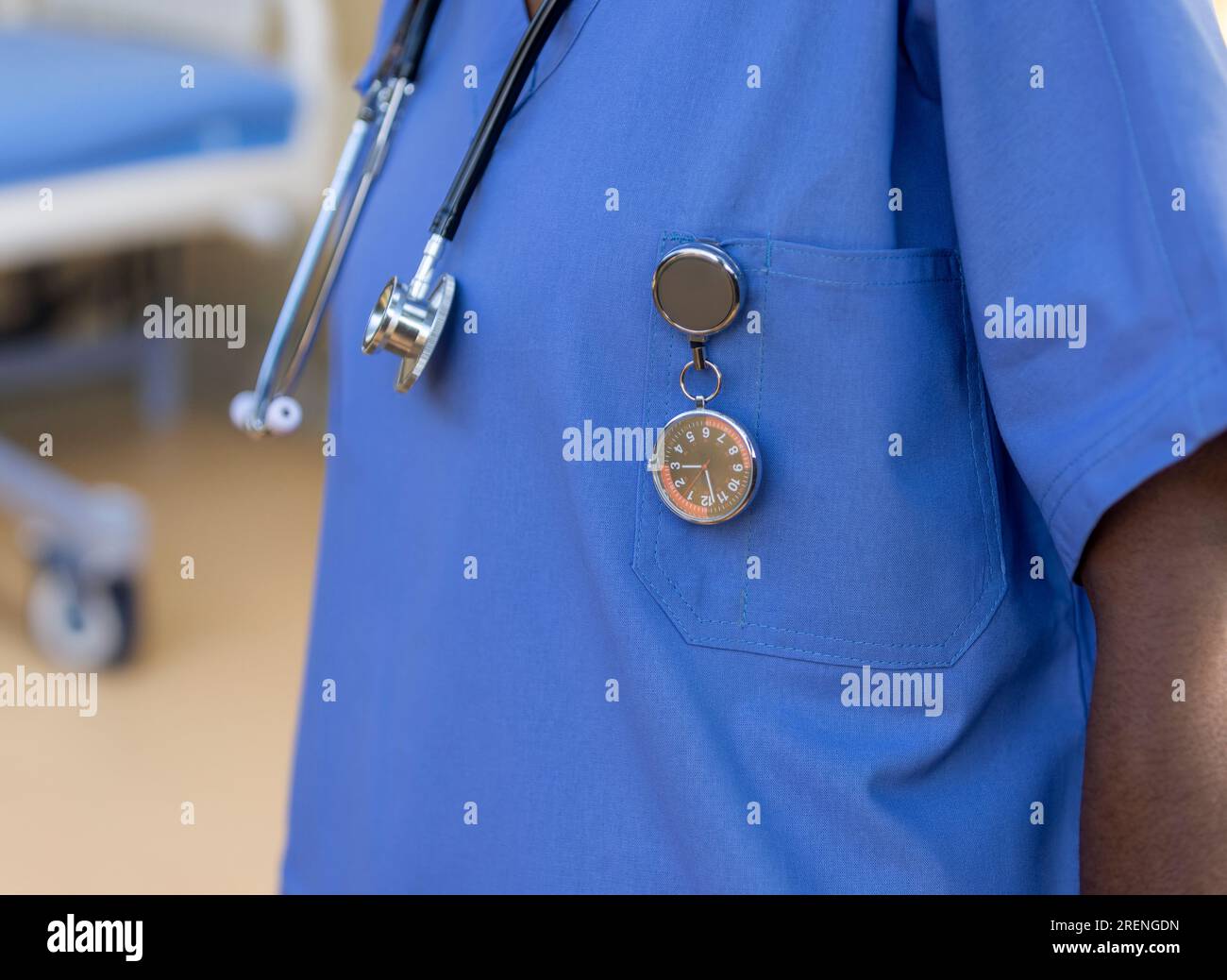 African nurse with a stethoscope and a specialized FOB watch, to keep