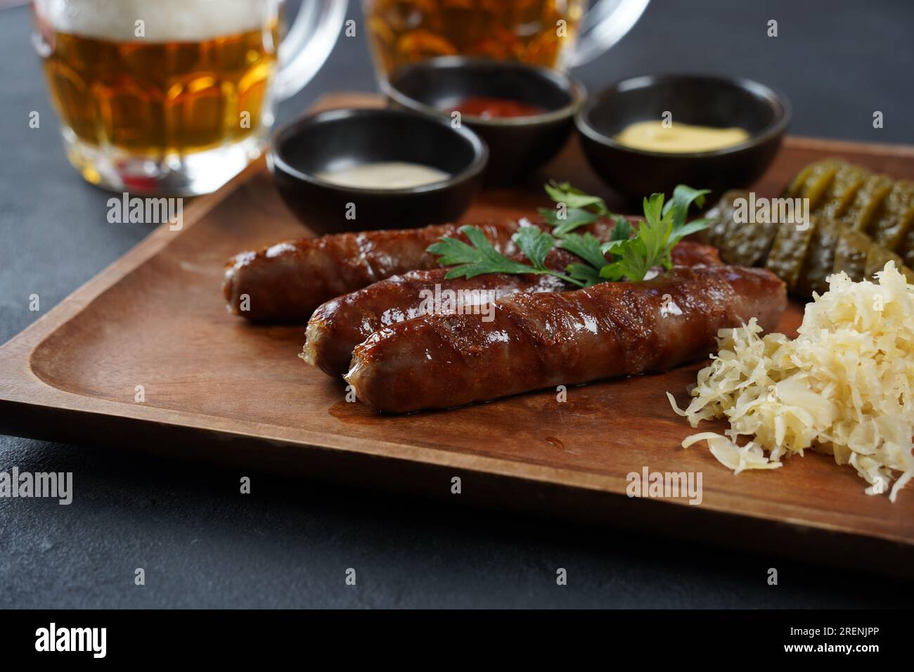 Fried sausages from Nuremberg with sauerkraut and horseradish Bavarian ...