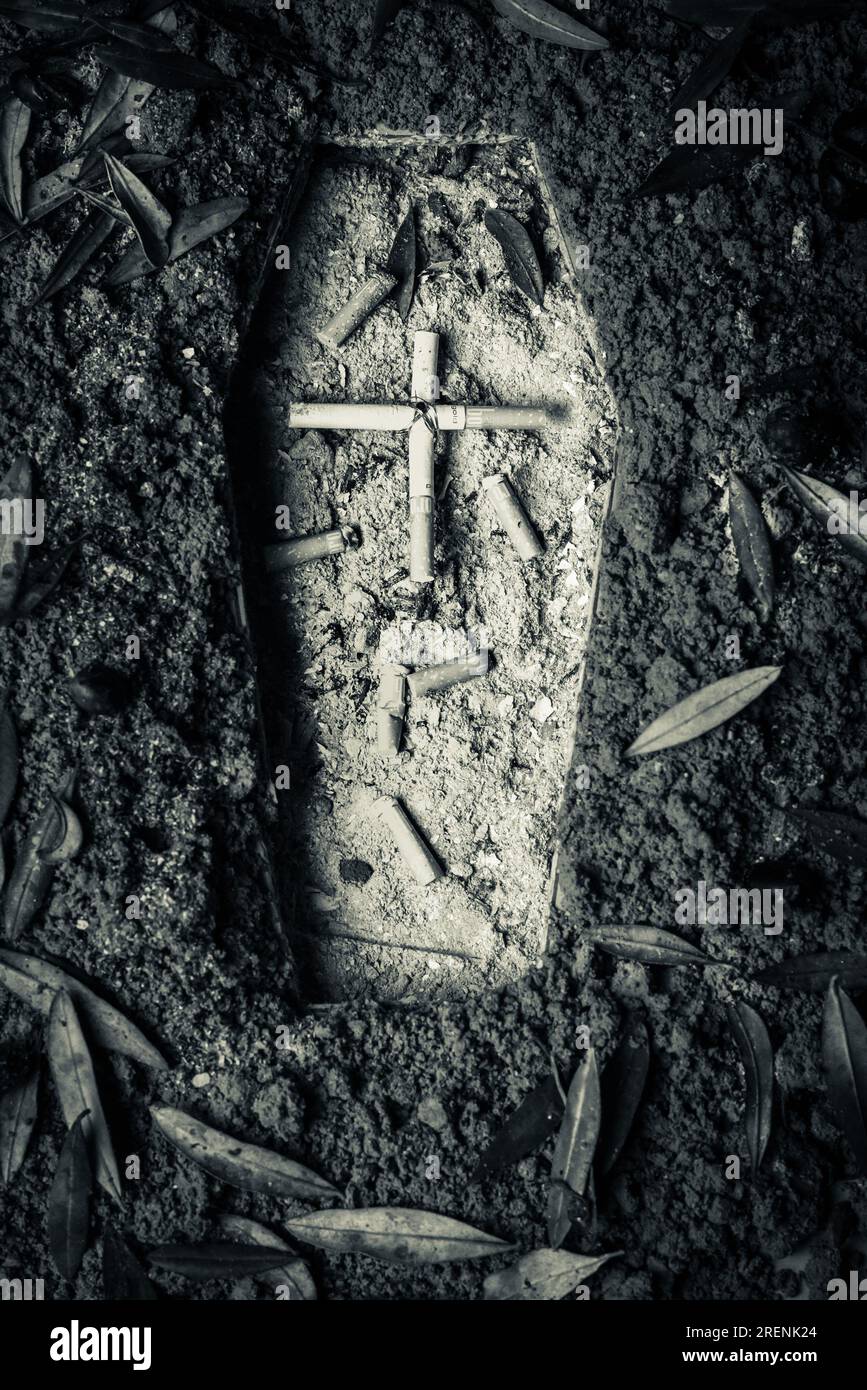 Death Shape Image representing Cigarettes and Death. Shape coffin on the ground ...