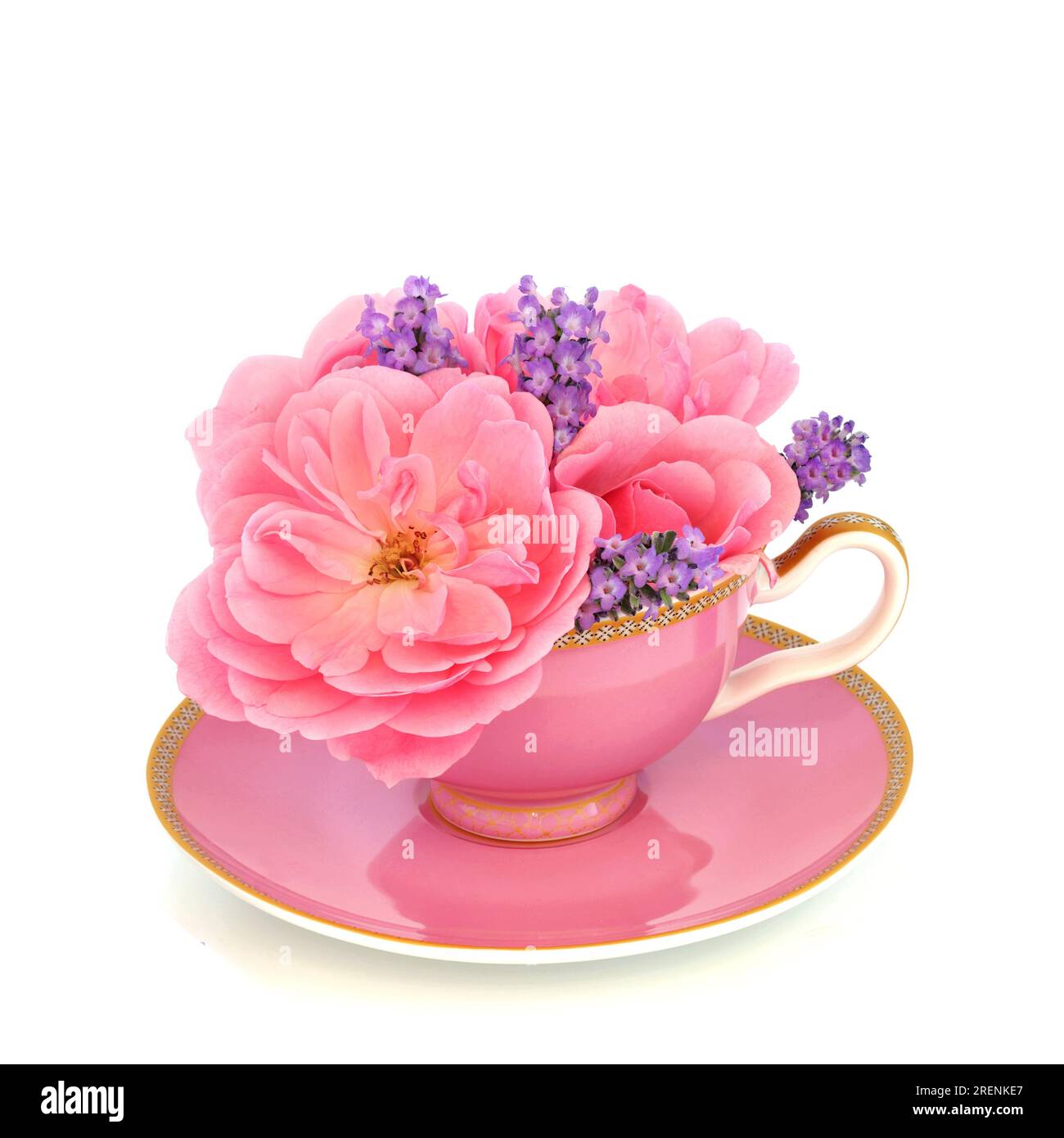 Lavender and pink rose flowers in tea cup on white. Surreal fun food