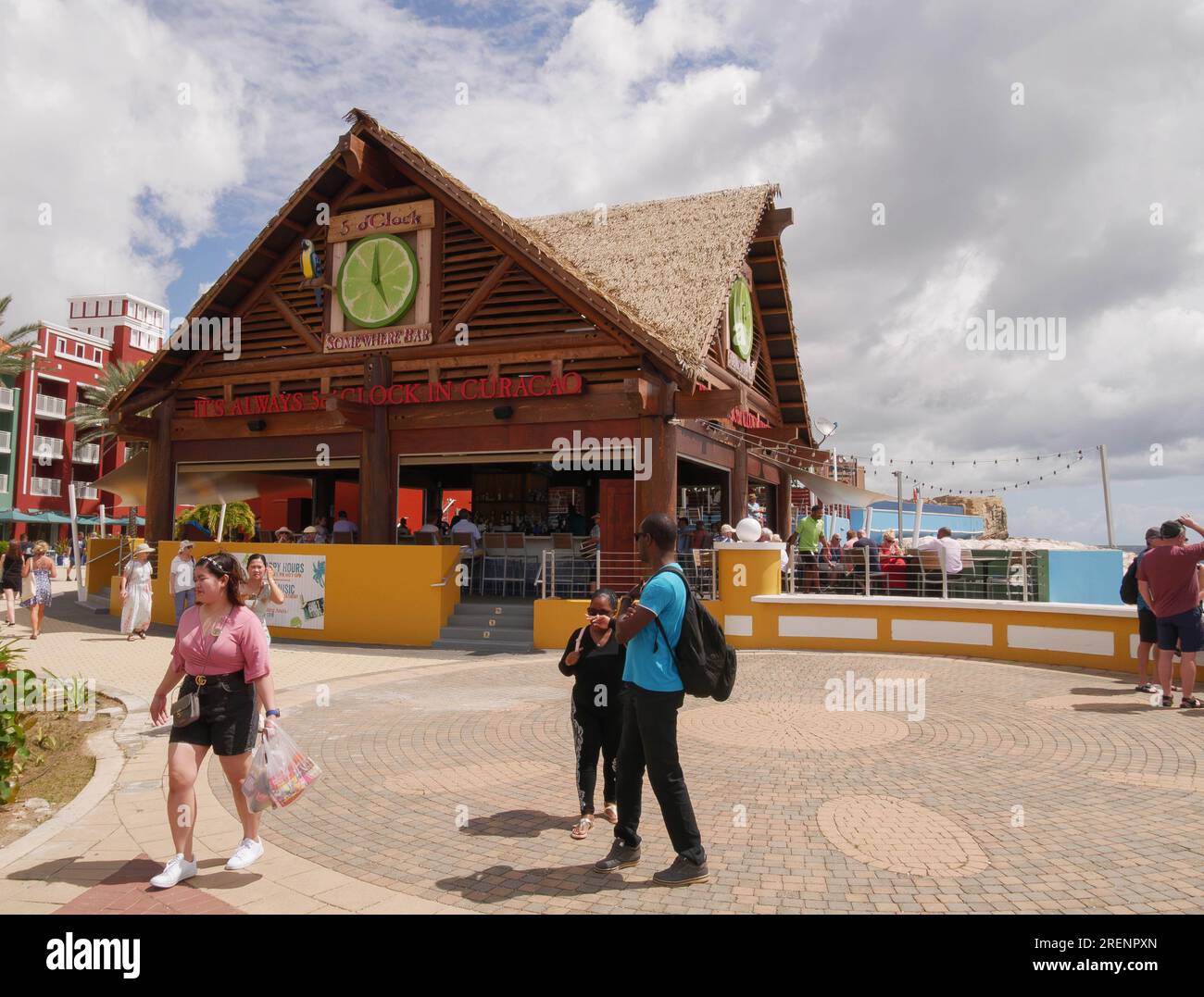 https://c8.alamy.com/comp/2RENPXN/the-5-oclock-somewhere-bar-near-the-cruise-terminal-on-a-bright-winters-day-with-people-in-the-foreground-2RENPXN.jpg