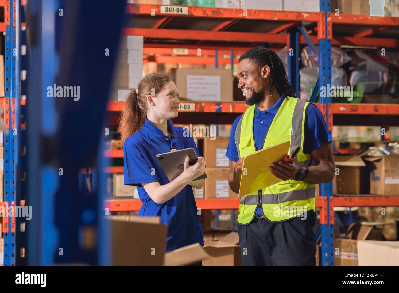 warehouse inventory worker happy working together diversity team friend at work cargo products depots Stock Photo
