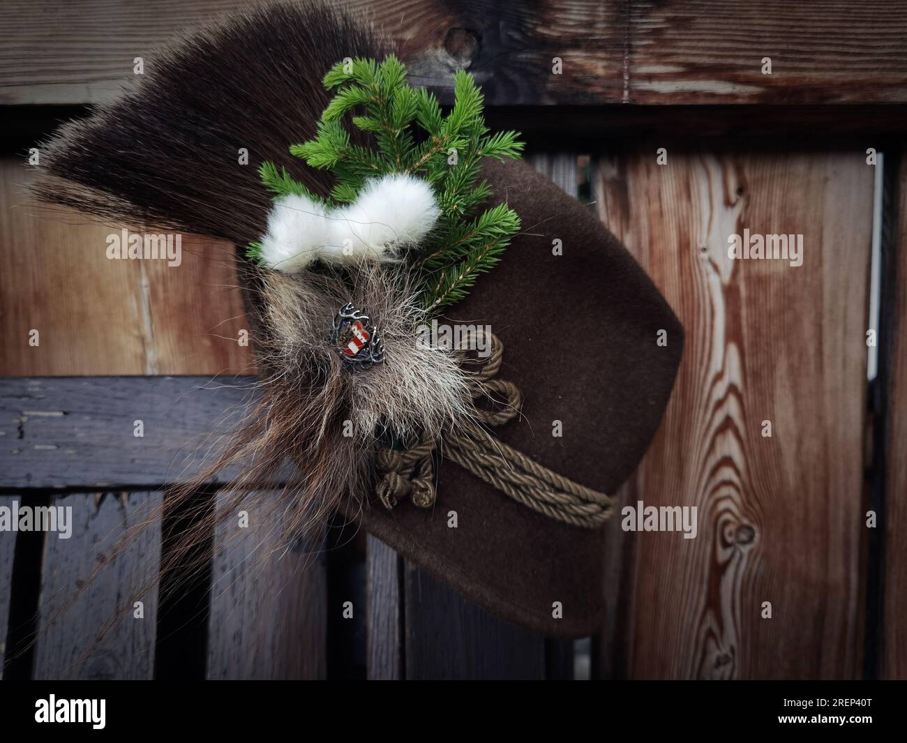 a traditional hunting hat with chamois hair, a spruce twig and cotton flowers after the hunt Stock Photo
