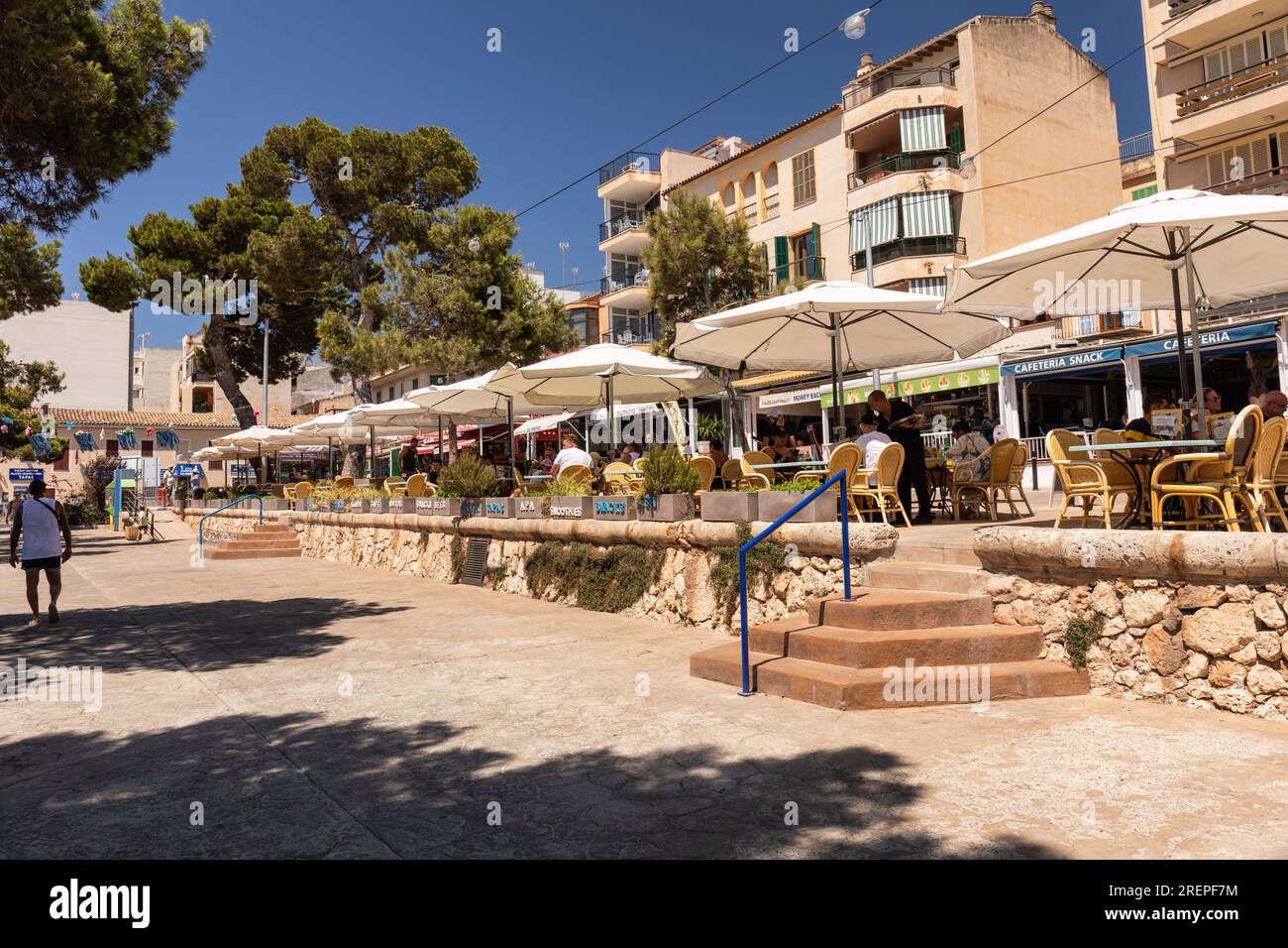 Picturesque Porto Cristo promenade lined with restaurants and cafes, Porto Cristo Majorca (Mallorca), Balearic Islands, Spain. Europe Stock Photo