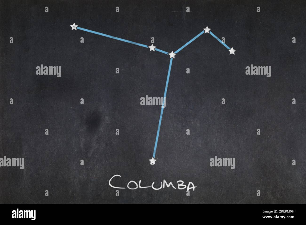 Blackboard with the Columba constellation drawn in the middle. Stock Photo
