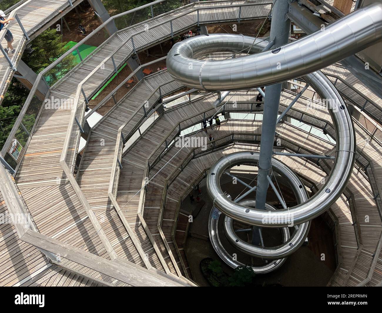 Bad Wildbad, Germany. 29th July, 2023. The treetop path with its slide on the Sommerberg in Bad Wildbad. The popular tourist attraction in the northern Black Forest is 1250 meters long and ends in the tower at a height of 40 meters. Credit: Marco Krefting/dpa/Alamy Live News Stock Photo