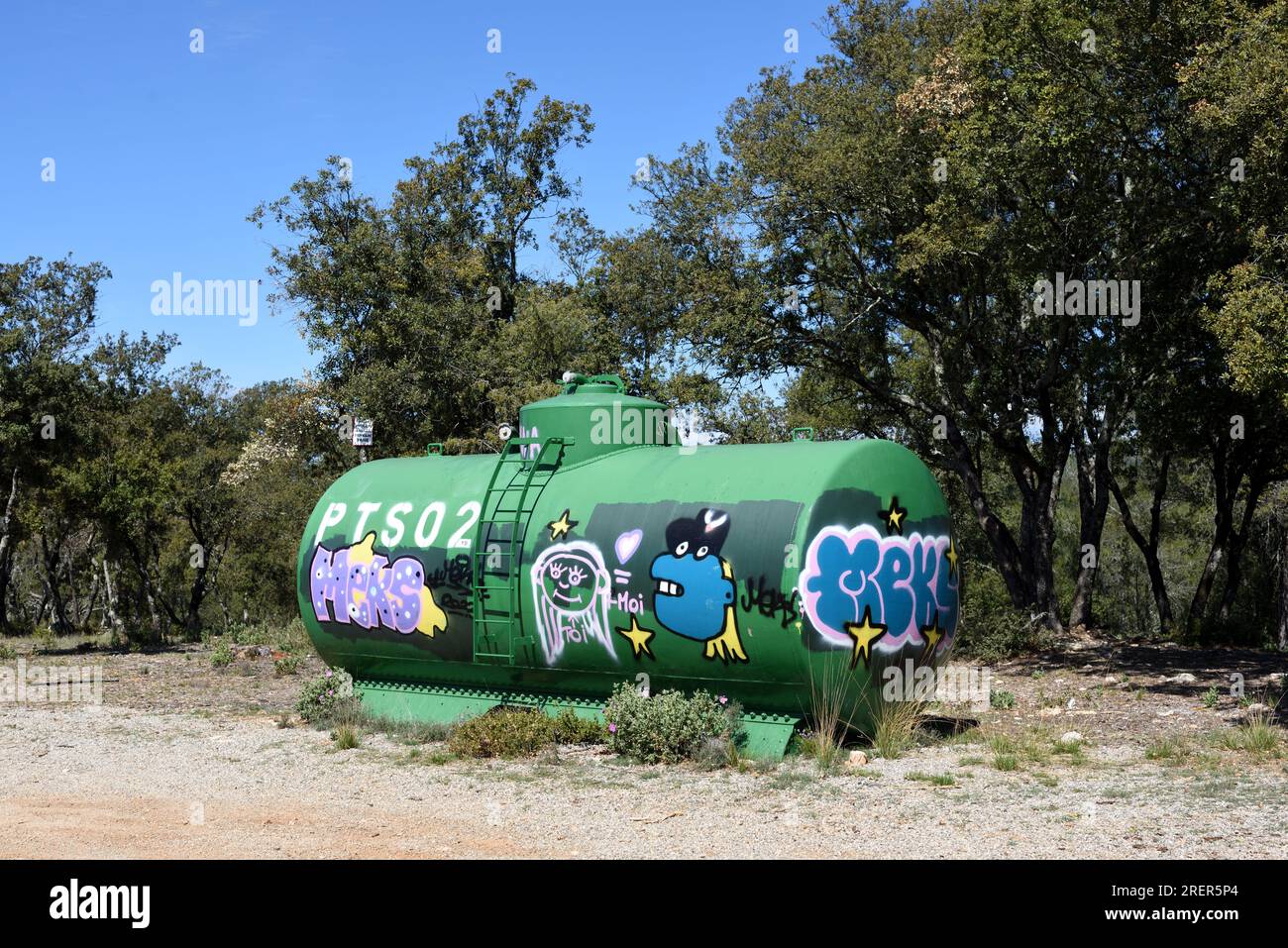 Graffiti-covered Water Storage Tank in the Forest in the Var Département Provence southern France. Water Reservoir to Fight Forest Fires Stock Photo