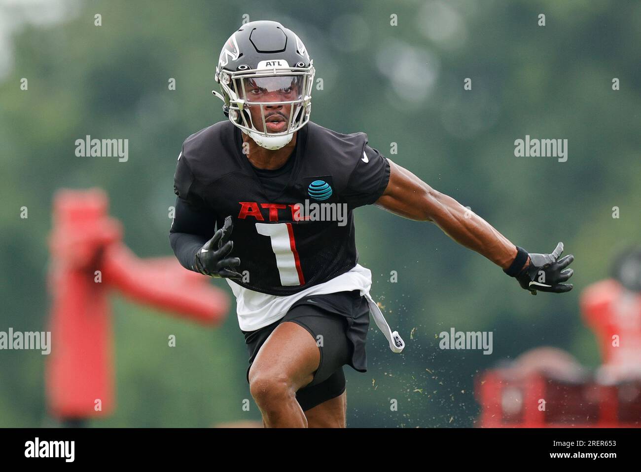 Atlanta Falcons cornerback Jeff Okudah (1) runs a drill during the NFL