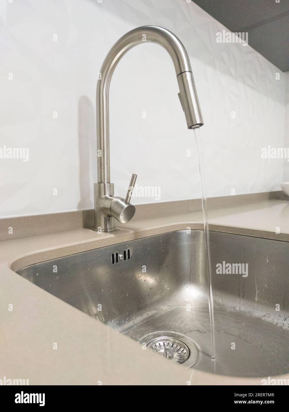 Open kitchen sink tap. Selective focus Stock Photo Alamy