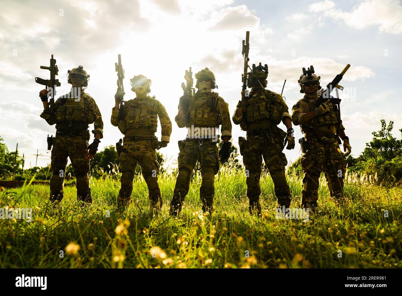 Smart teamwork of soldiers running forward and attacking enemy during ...