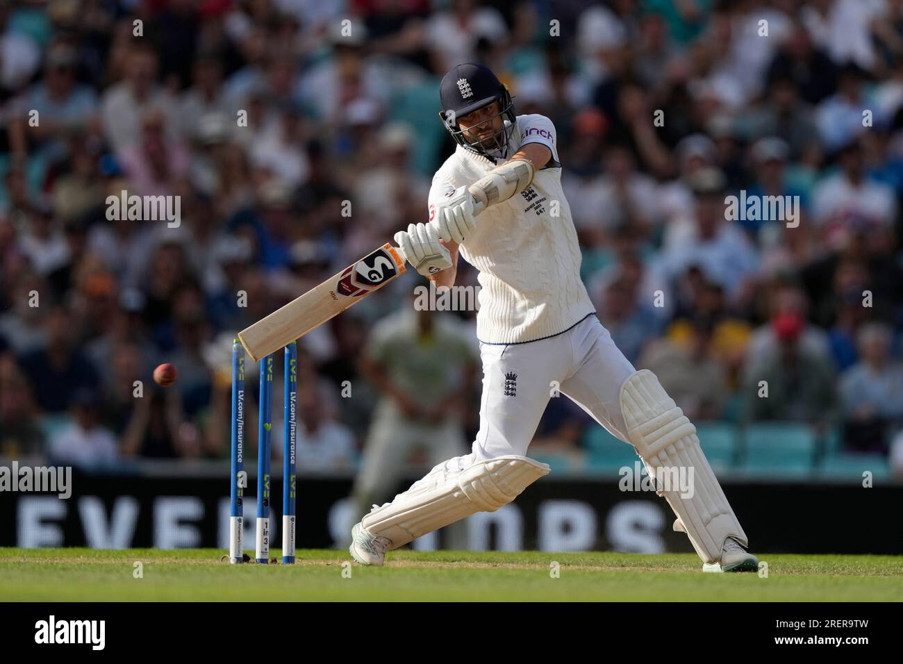 England's Mark Wood plays a shot on day three of the fifth Ashes Test