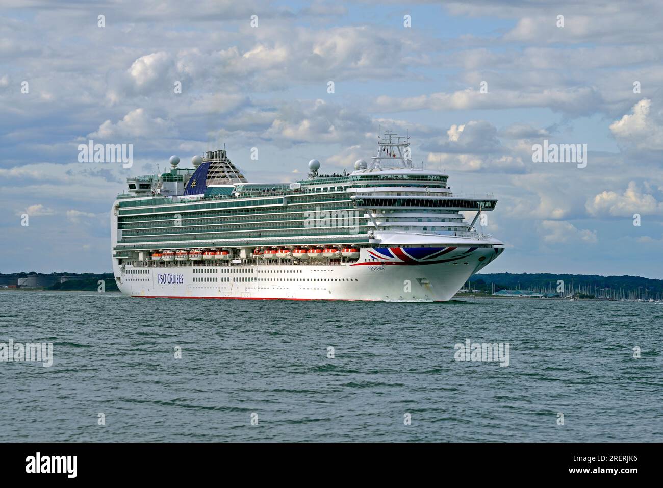 P&O Cruises Liner 'Ventura' heads down Southampton Water and into the Solent. She will drop her pilot at the Nab and move out into the English Channel. Stock Photo