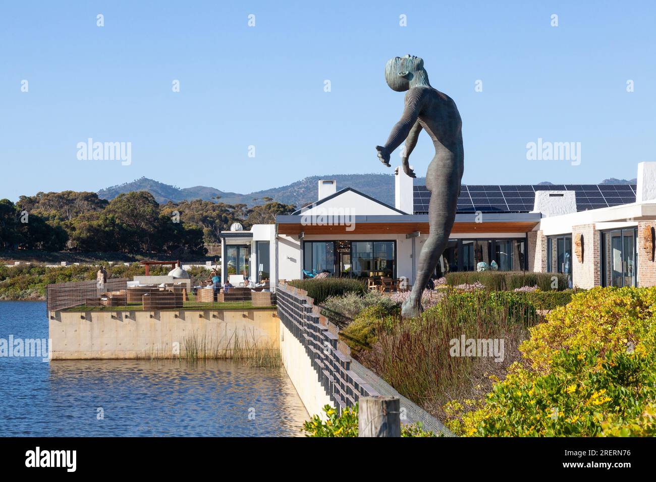 Benguela Cove Winery, Walker Bay, Hermanus, Western Cape Winelands, South Africa with 'Faith' bronze sculpture by Anton Smit Stock Photo