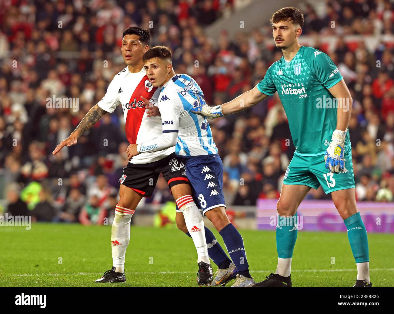 River Plate's midfielder Enzo Perez (L) waits for the ball next Racing Club's defender Tobias Rubio (C) and goalkeeper Matias Tagliamonte during the Argentine Professional Football League Tournament 2023 match at El Monumental stadium, in Buenos Aires, on July 28, 2023.  (Photo by Alejandro Pagni / PHOTOxPHOTO) Stock Photo