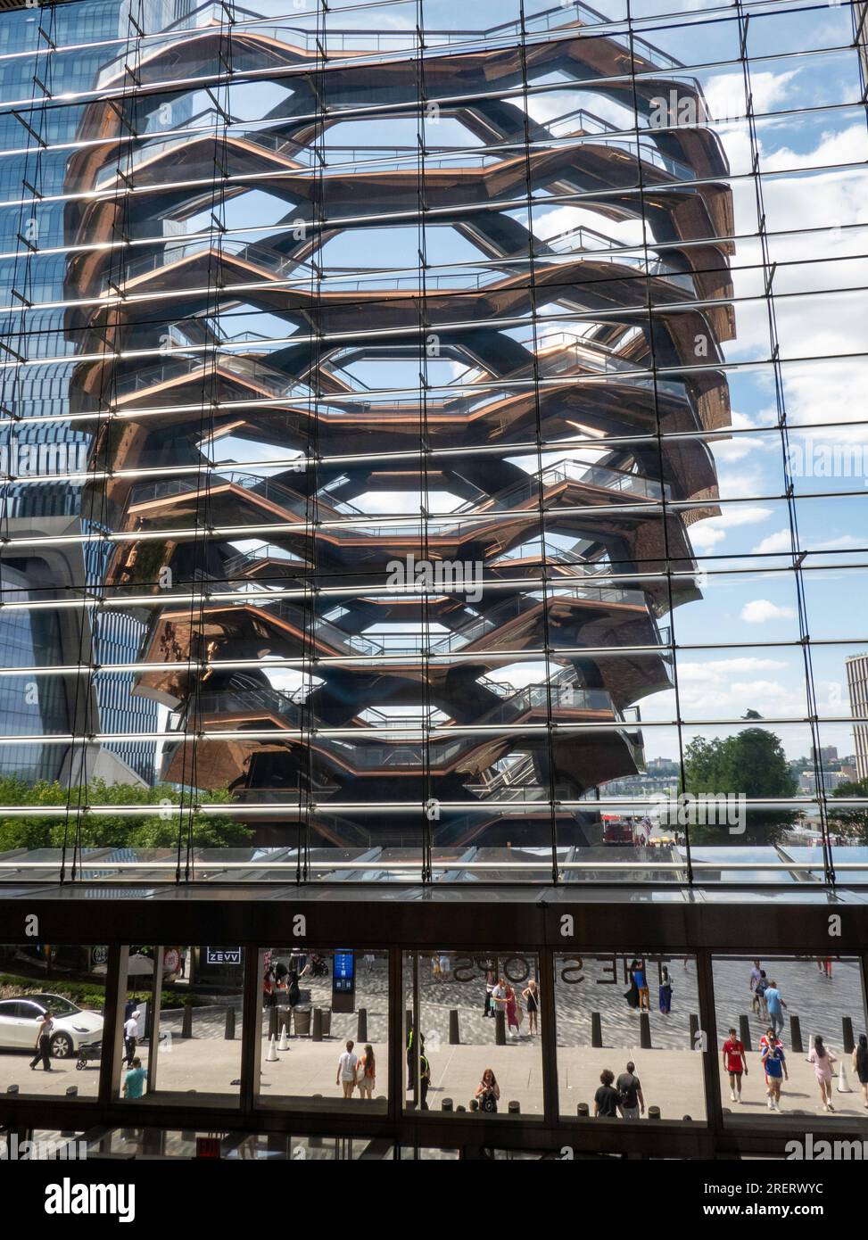 The vessel a multi storied copper clad interactive art piece as seen from the shops at Hudson yards, 2023, New York City, USA Stock Photo