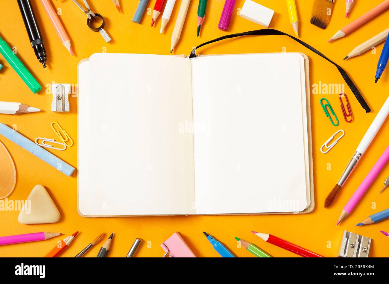School supplies on yellow background Stock Photo