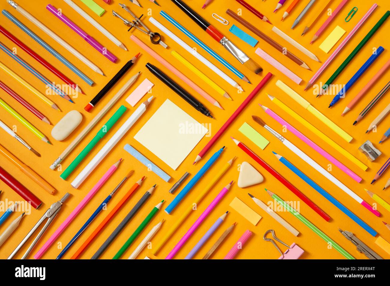 School supplies on yellow background Stock Photo