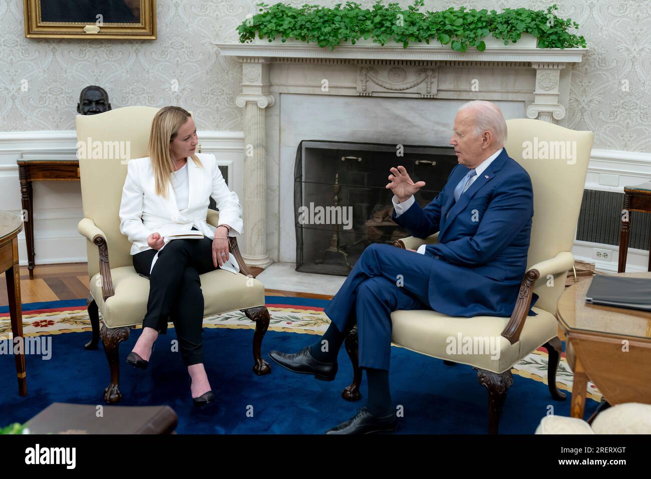 Washington, United States of America. 27 July, 2023. U.S President Joe Biden, right, speaks with Italian Prime Minister Giorgia Meloni during a bilateral meeting at the Oval Office of the White House, July 27, 2023 in Washington, D.C.  Credit: Adam Schultz/White House Photo/Alamy Live News Stock Photo