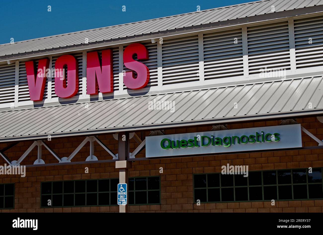 Vons grocery store and Quest Diagnostics signs in California Stock