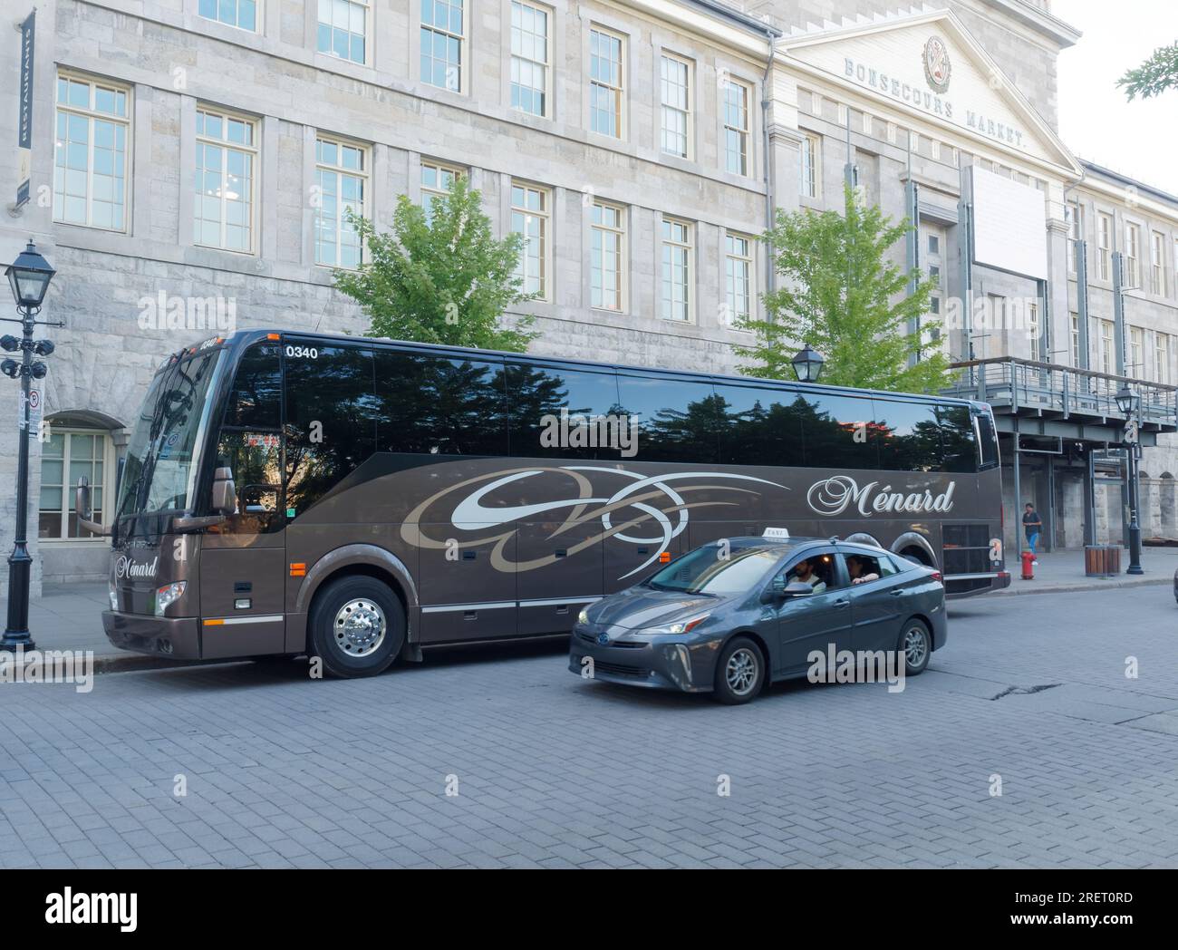 Menard charter coach bus parked curbside in old Montreal, Quebec,Canada Stock Photo