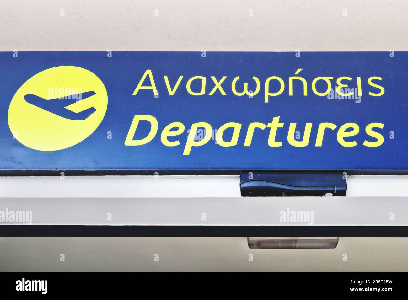 Close up Of The Sign On The Mykonos Airport Meaning departures close-up-of-the-sign-on-the-mykonos-airport-meaning-departures