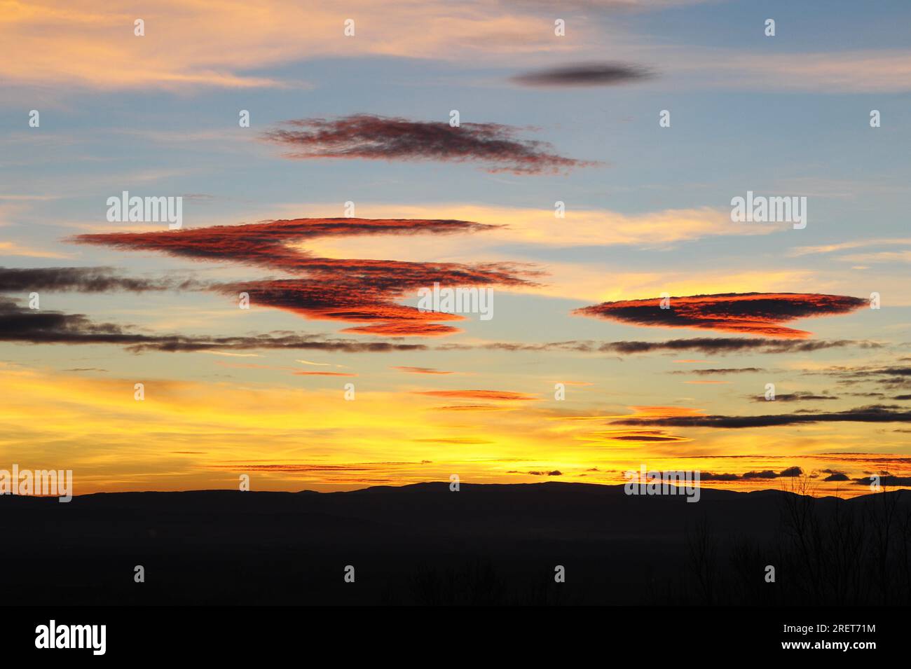 Clouds in bizarre form of a spaceship of the alien Stock Photo