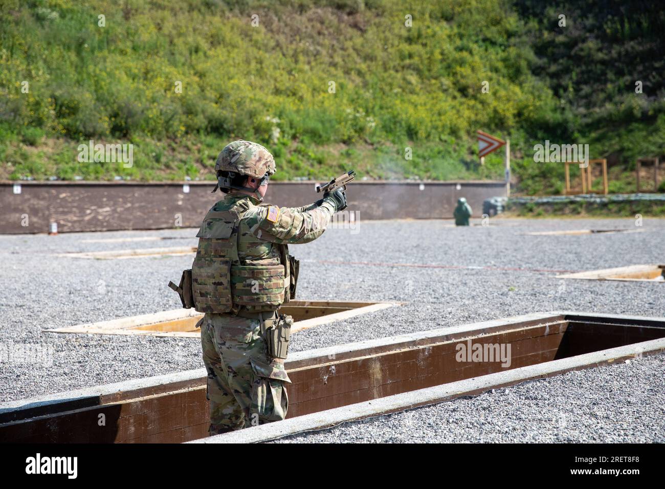 U.S. KFOR Soldiers assigned to Regional Command East engage targets during an M17 pistol range on Camp Bondsteel, Kosovo, on July 17, 2023. Basic marksmanship is a core Soldier skill that all military members need to maintain. (U.S. Army National Guard photo by Sgt. Noah Moroski) Stock Photo