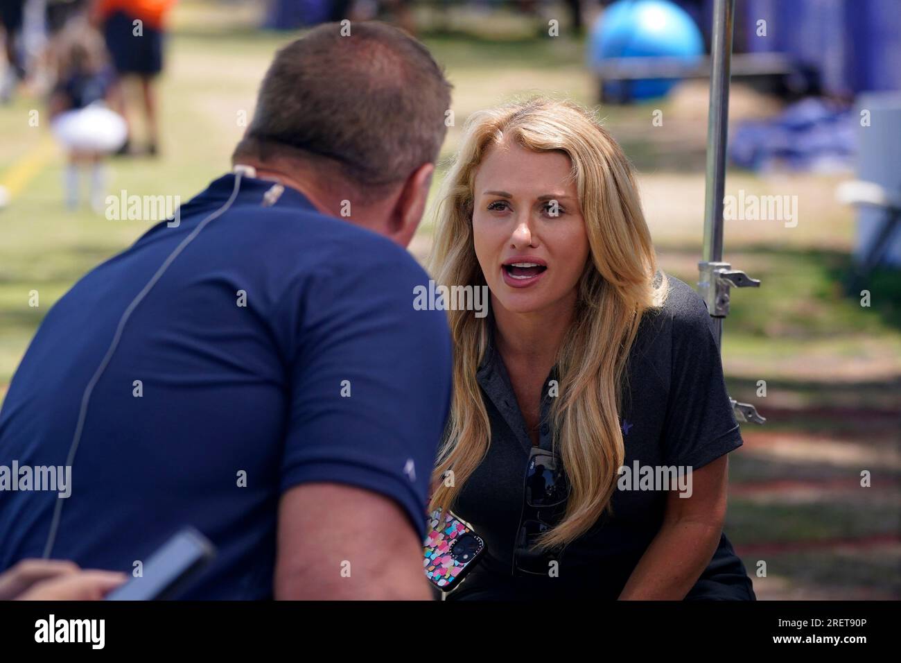 The NFL Network's Chris Rose, left, and Brain Baldinger, center, interview  Dallas Cowboys head coach Mike McCarthy at the Cowboys' NFL football  training camp Saturday, July 29, 2023, in Oxnard, Calif. (AP