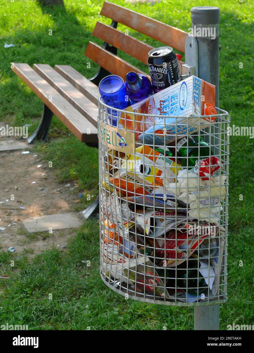 Overfilled litter bin, wastepaper bin with bottles and cans, beverage