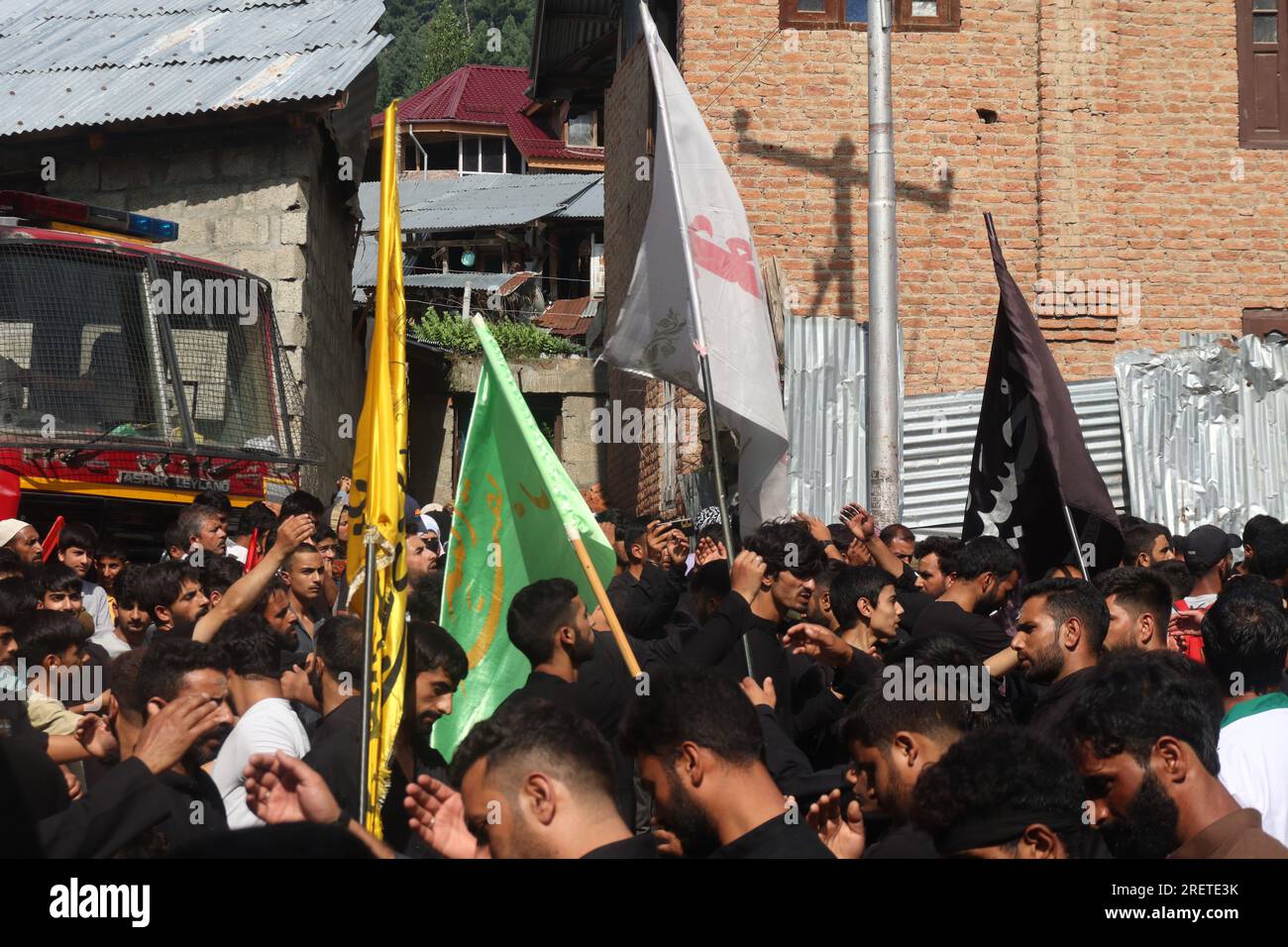 India. 29th July, 2023. Kashmiri Shite Muslim mourners take part in a ...