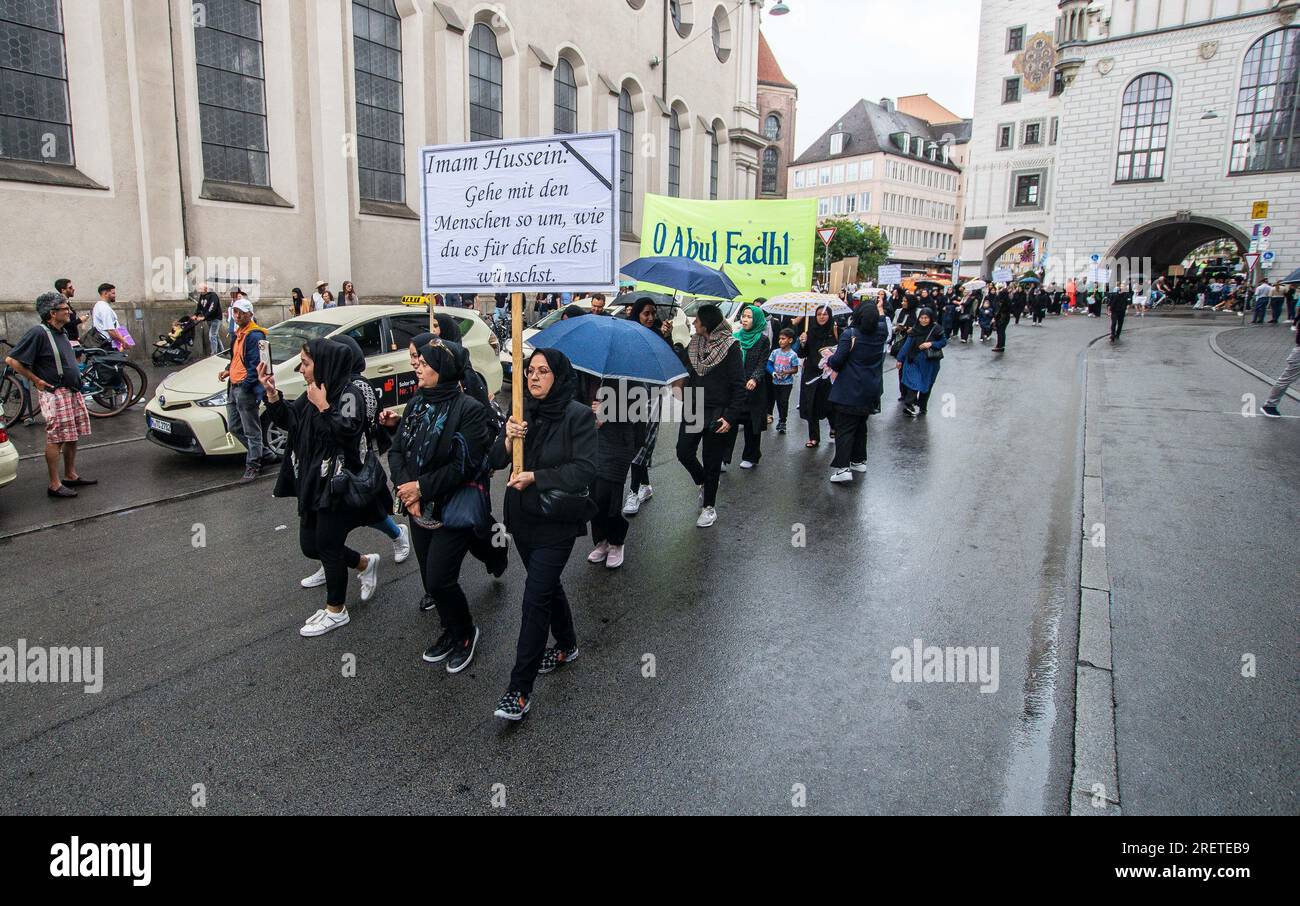 July 29, 2023, Munich, Bavaria, Germany: The Ahlul Bayt Kulturverein Muenchen e.V. organized an Ashura Trauermarsch (funeral march) for third Imam of Shiite Islam Husayn al Abidin- said to be a grandson of Mohammed whose death is one of the sources of Shiite-Sunni tensions. The Ahlul Bayt Kulturverein is seen as being connected to or being an arm of the Iranian regime and is officially under the Islamische Gemeinschaft der Schiitischen Gemeinden (IGS) who, in the past, has been linked to the controversial al-Quds Tag demo. The Ashura marches are better known as the events in Iran, Afghanistan, Stock Photo