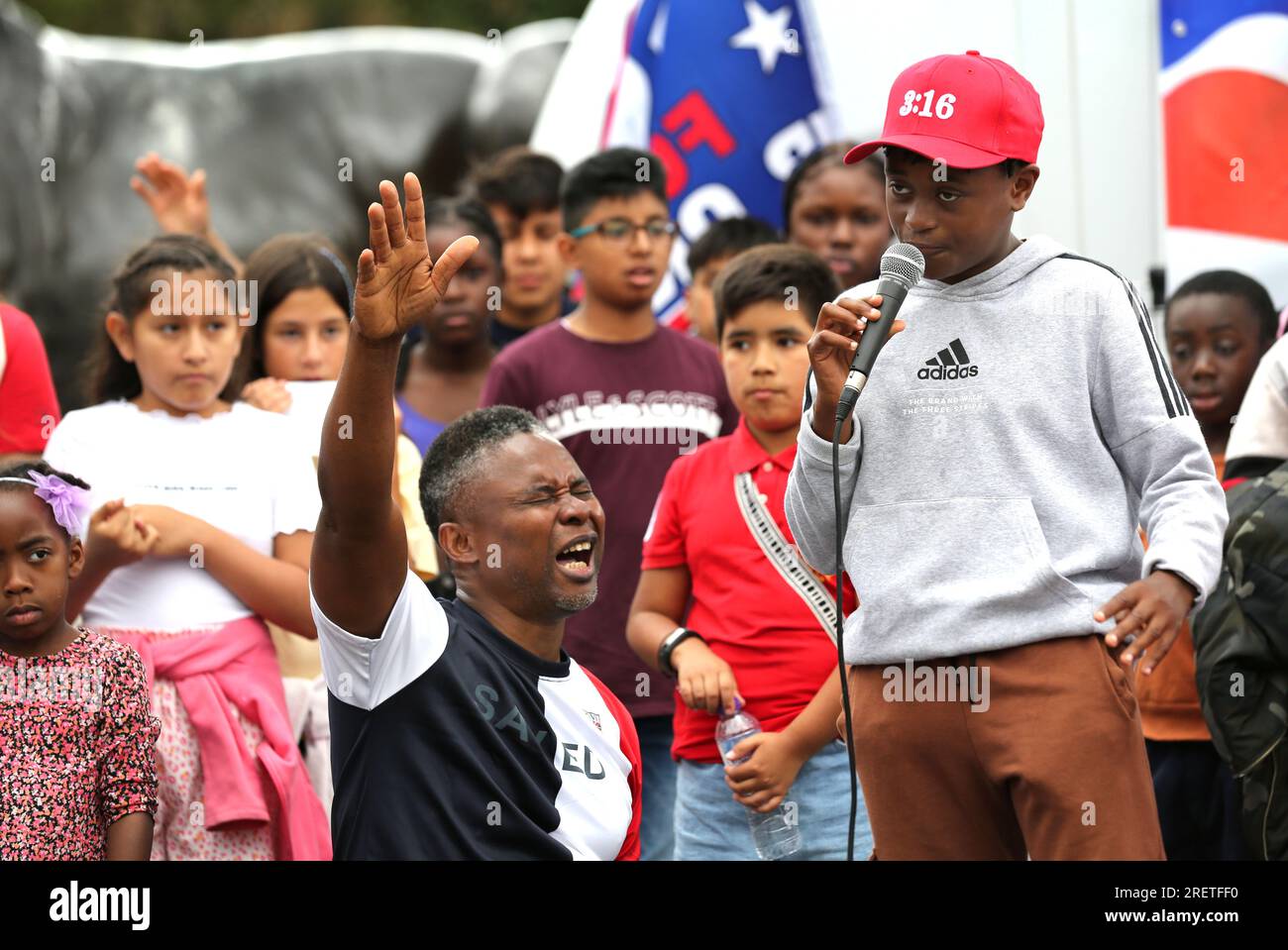 London uk 29th july 2023 a young worshiper on the stage speaks of