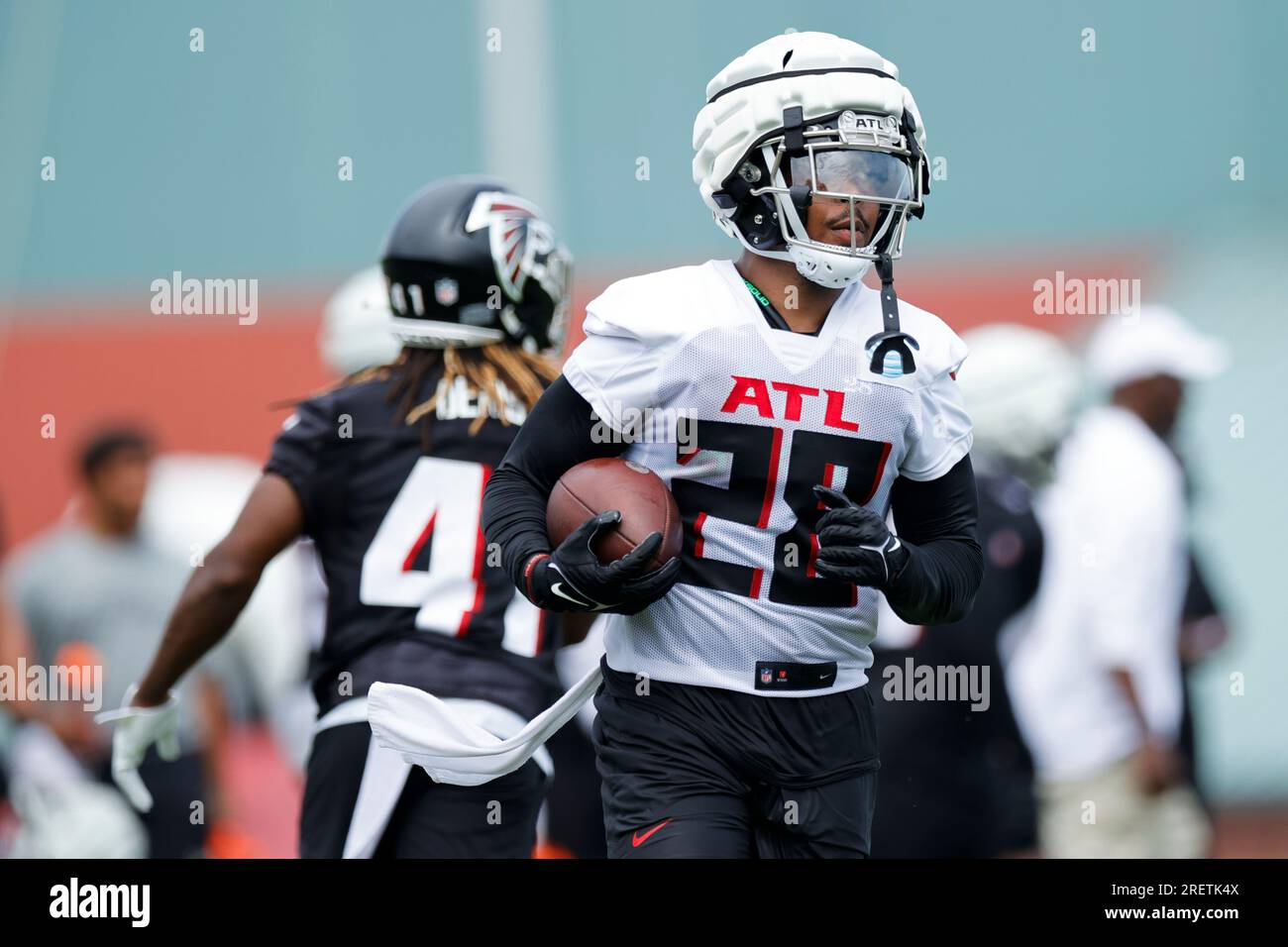 Atlanta Falcons running back Carlos Washington Jr. (28) runs the