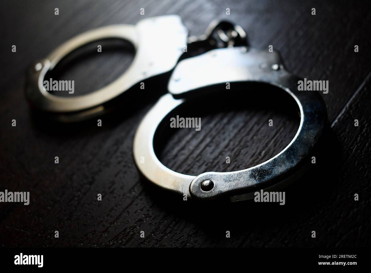 Jail prison handcuff hi-res stock photography and images - Alamy