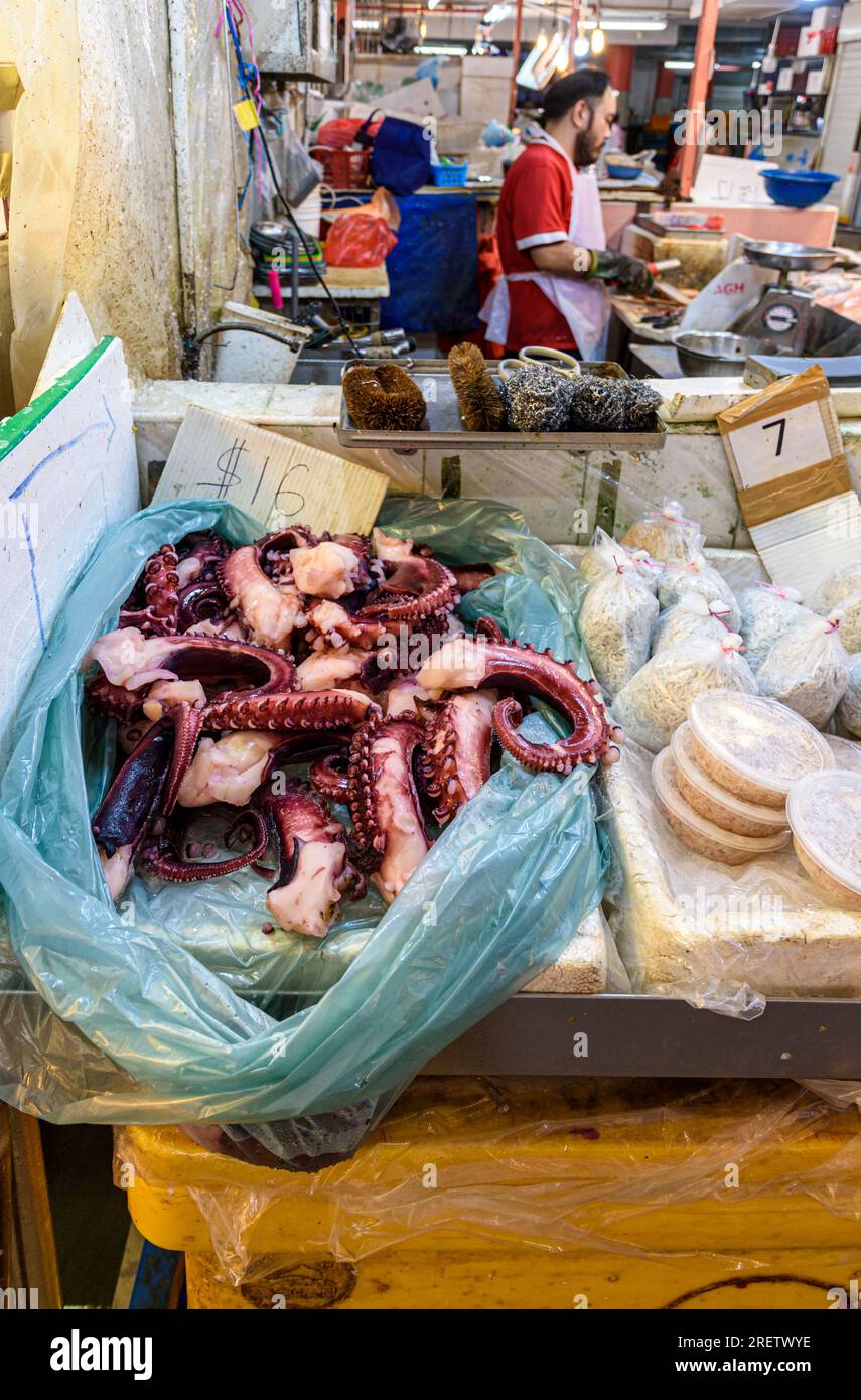 Fresh octopus on display at a stall in the Chinatown Complex wet market, Chinatown, Singapore Stock Photo