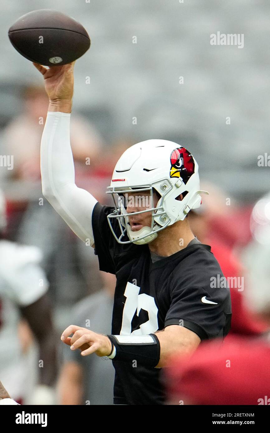 Arizona Cardinals quarterback Colt McCoy puts his helmet on during NFL  football training camp practice at State Farm Stadium Friday, July 28,  2023, in Glendale, Ariz. (AP Photo/Ross D. Franklin Stock Photo 