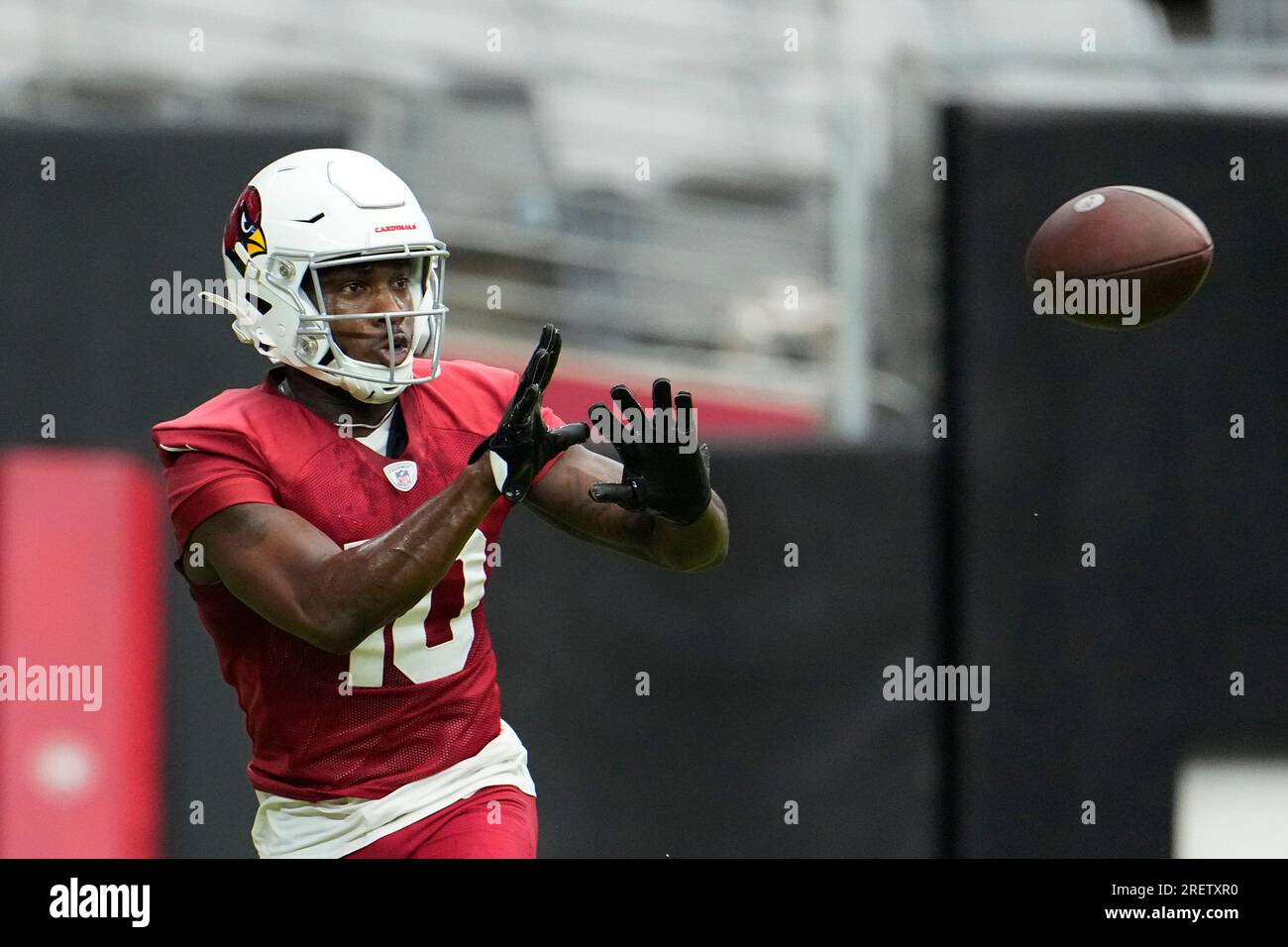 Arizona Cardinals wide receiver Davion Davis (10) runs down the field  during the first half of an NFL preseason football game against the  Minnesota Vikings, Saturday, Aug. 26, 2023, in Minneapolis. (AP