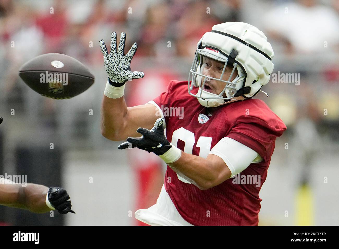 Arizona Cardinals tight end Noah Togiai reaches out to make a catch during  NFL football training camp practice at State Farm Stadium Saturday, July 29,  2023, in Glendale, Ariz. (AP Photo/Ross D.