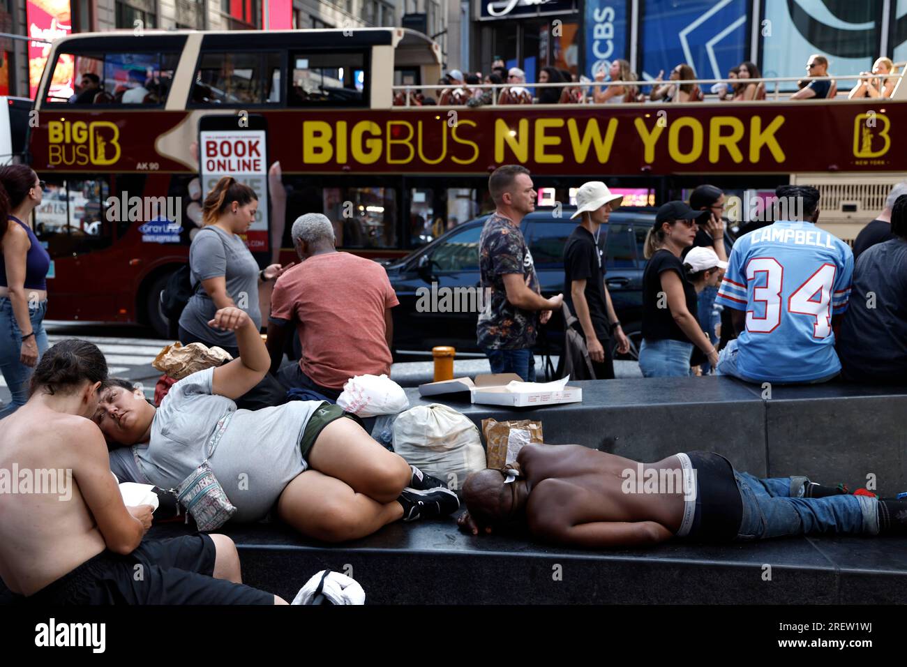 People sleep in Times Square on July 29, 2023 in New York City, USA