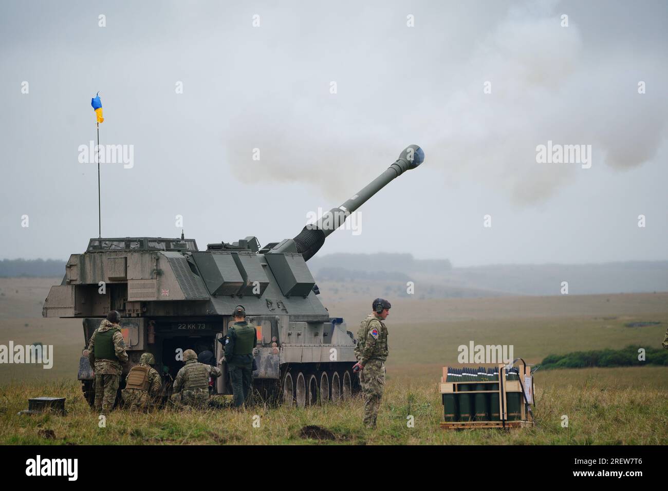 Newly trained Ukrainian artillery specialists firing British donated AS90 155mm self-propelled artillery guns under the supervision of British Army instructors as they come to the end of their training in south west England. Picture date: Thursday July 27, 2023. Stock Photo