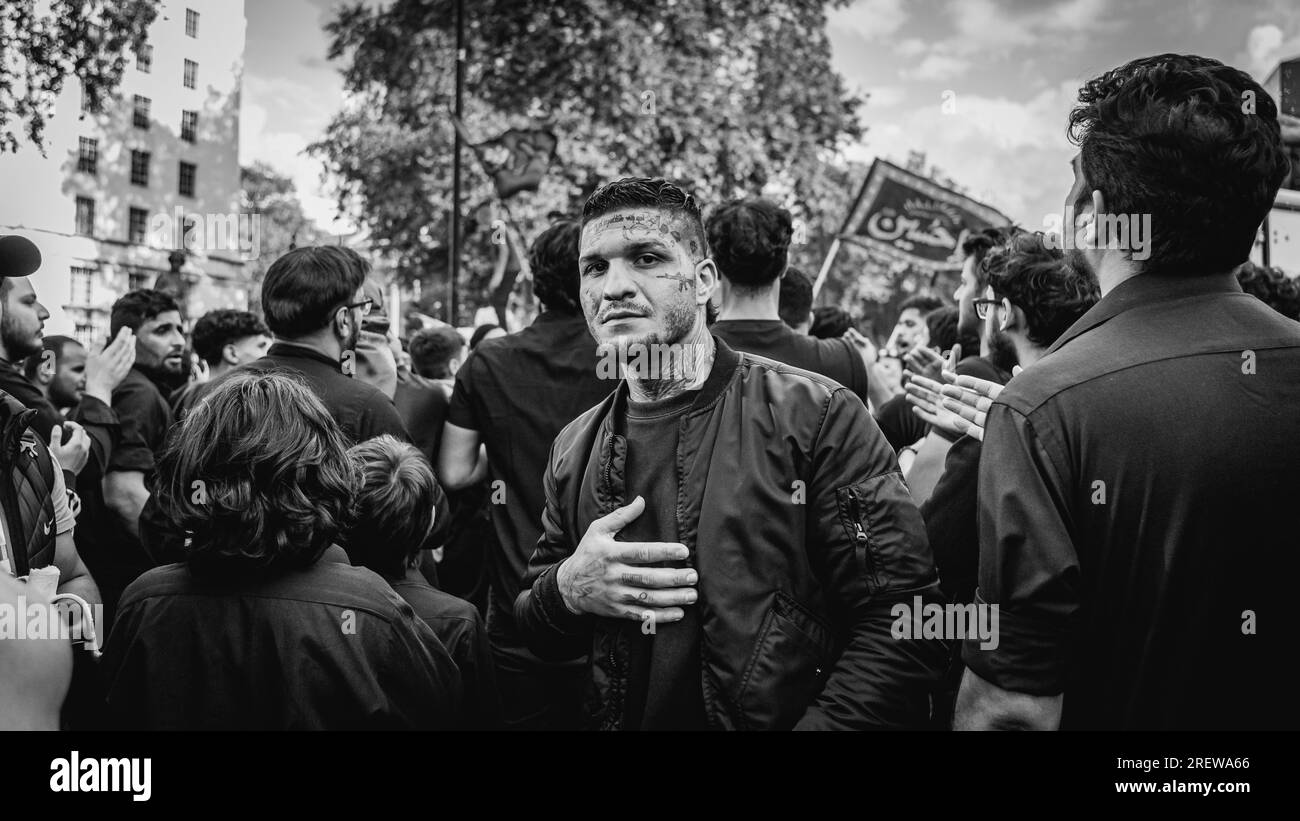 Thousands of Shia Muslims joined in a march in London to commemorate Ashura, the day when Imam Hossein was martyred with his 72 loyal companions. Stock Photo