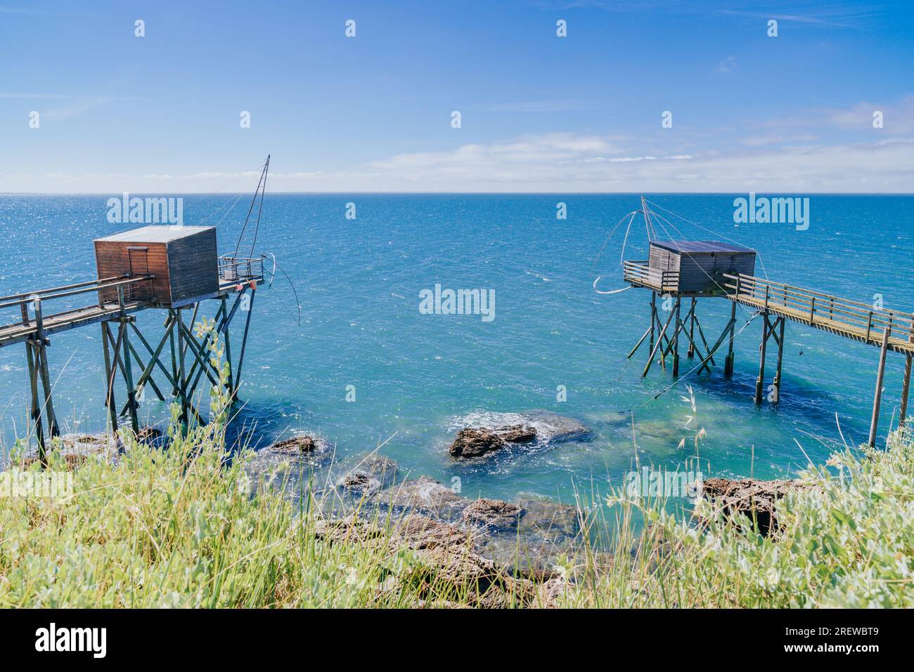 Traditional fishery huts made of wood by the Jade Coast in Pornic, France Stock Photo