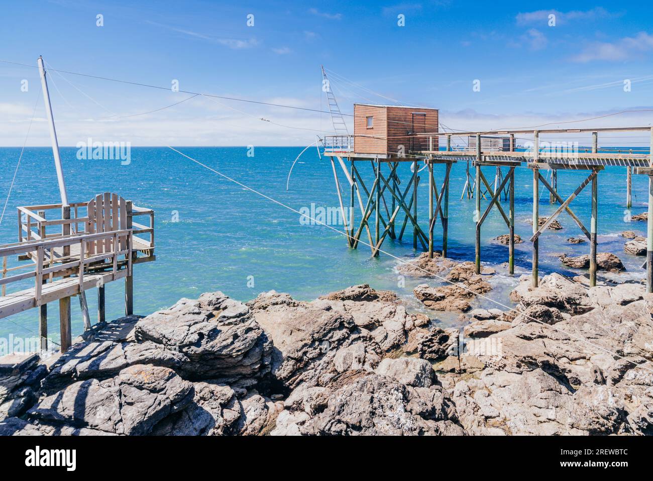Traditional fishery huts made of wood by the Jade Coast in Pornic, France Stock Photo